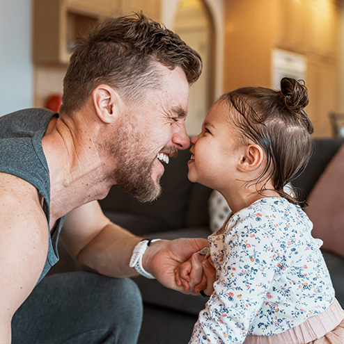 dad and daughter rubbing noses