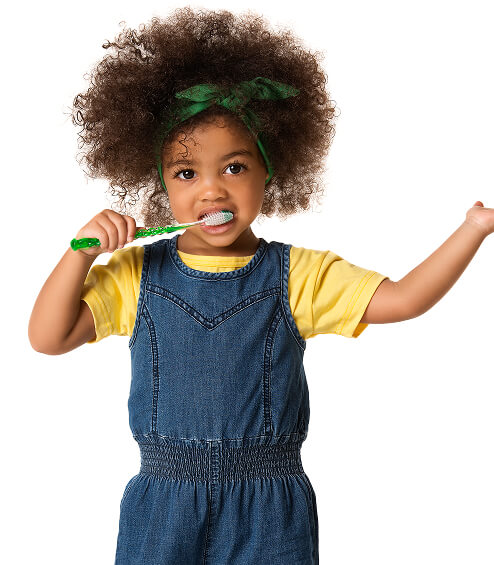 young girl brushing teeth